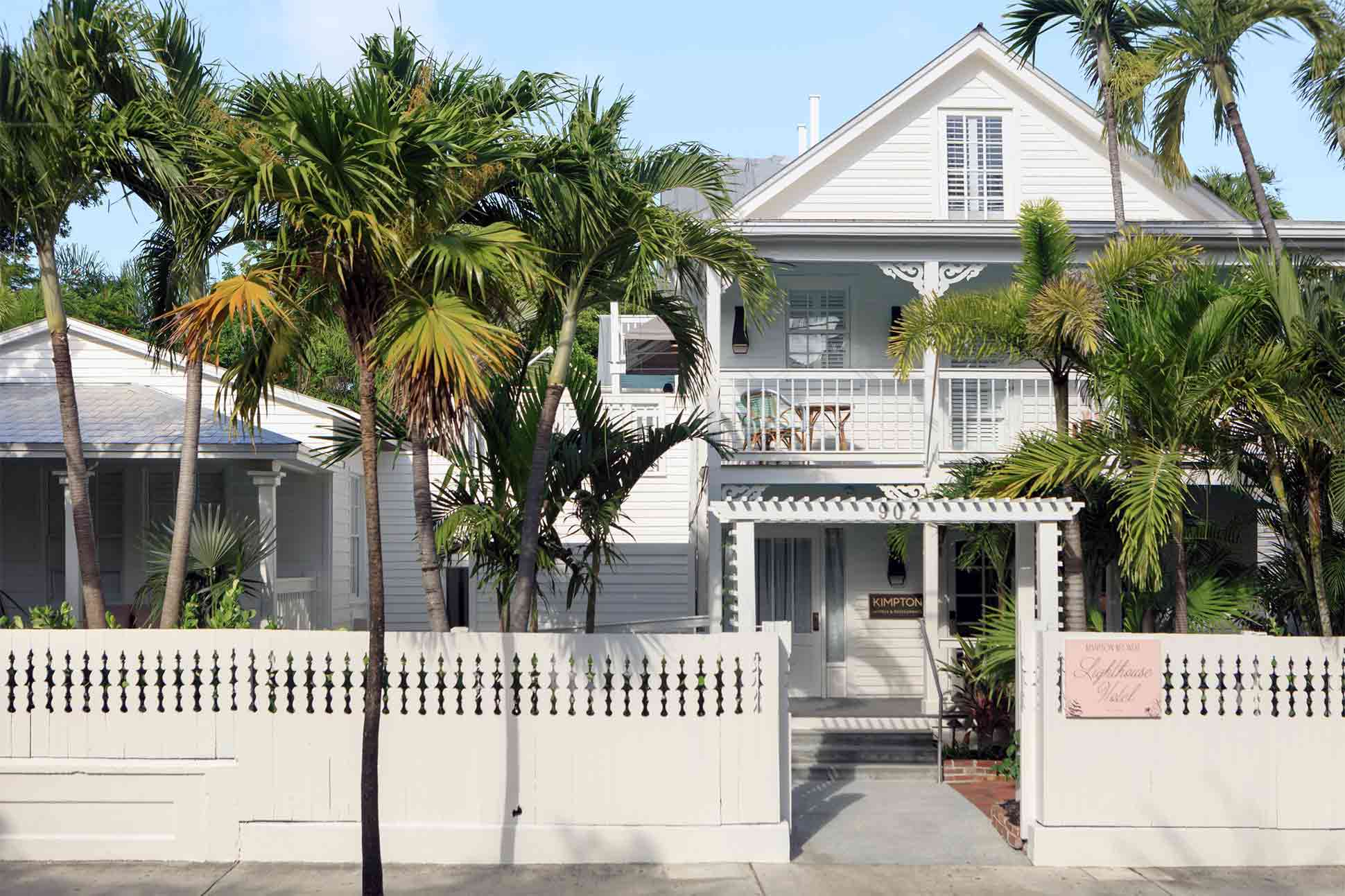 Kimpton Lighthouse Hotel garden grounds adjacent to Key West Lighthouse — Old Town Key West boutique hotel