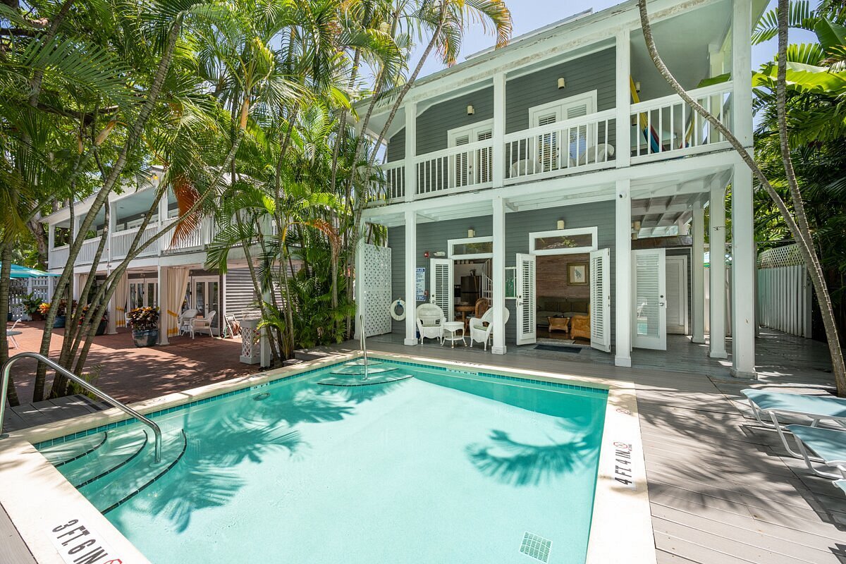 Ambrosia Key West bed and breakfast poolside breakfast courtyard on Fleming Street