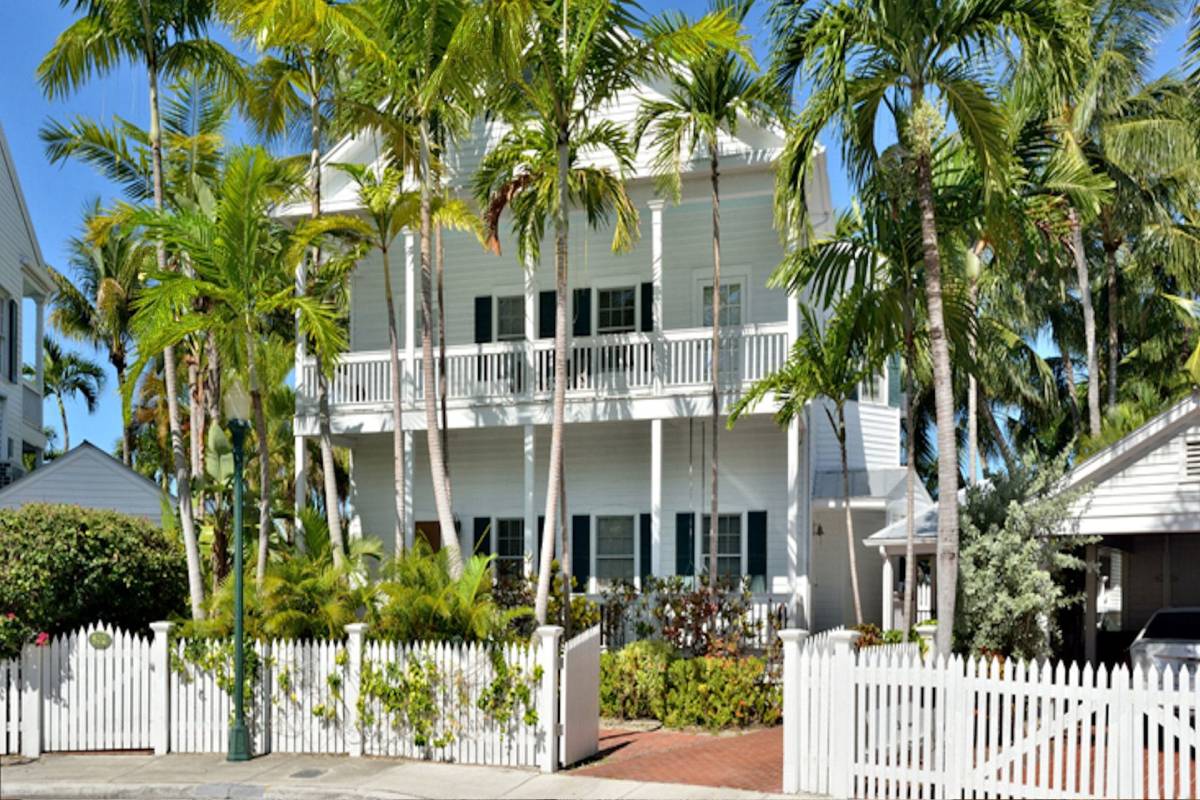 Truman Annex Key West palm-lined streets and historic Naval buildings near Fort Zachary Taylor