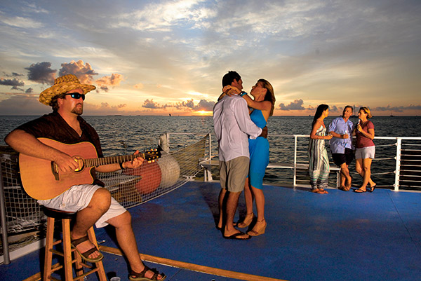 couple dancing on sunset cruise